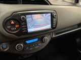 the dashboard of a car with a gps device on the dash