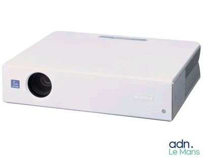 an image of a white projector sitting on top of a table