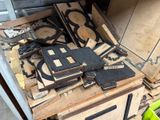 many pieces of wood that are sitting on top of a table