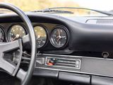 a dashboard of a car with gauges and a steering wheel