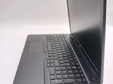 a laptop computer that is sitting on a table