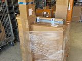 a large stack of boxes sitting on a pallet in a warehouse