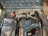an image of a tool box with a hammer, drill and other tools