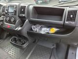 a view of the inside of a truck with the dashboard and dashboard controls