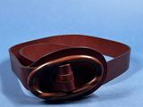 a close up of a brown leather belt with a metal buckle