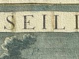 a close up of a sign on the wall of a building