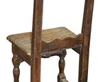 wooden chair with a wooden seat and a wooden back rest
