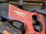 a tool in a tool box with a hammer and other tools