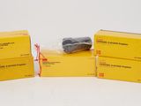 three boxes of yellow boxes with a red string on them