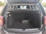 the trunk of a car with a pair of glasses and a pair of sunglasses in it