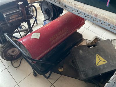 a red fire extinguisor sitting on top of a cart