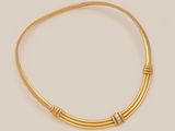a gold and diamond necklace, by cartier