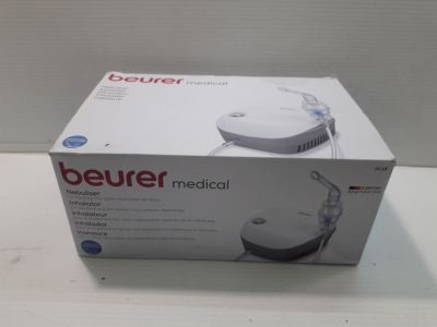 the box of a medical device is sitting on the table