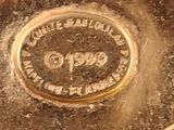 a close up of a metal object with a pin in it