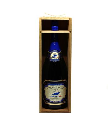 a bottle of champagne in a wooden box on a white background