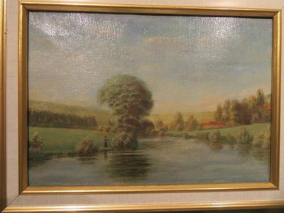 une image d'un tableau sur le mur d'une pièce