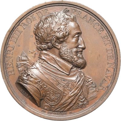 une image représentant une médaille de bronze à l'effigie d'un homme barbu et moustachu