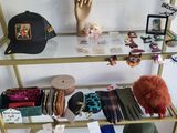 a shelf that has a lot of items on it