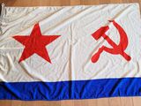 an image of a flag with a hammer and star on it