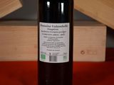 a bottle of wine that is sitting on a table