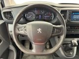 the dashboard of a car with a steering wheel and dashboard controls