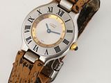 une image d'une montre de poignet de femme avec des chiffres romains