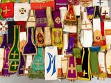 many different types of vests that are on display