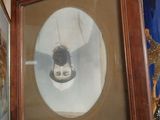 a picture of a picture of a man with a cone on his head