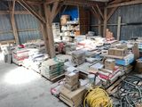 a large amount of boxes and other items in a warehouse