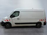a white van that is parked in a parking lot