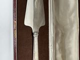 a knife in a case that is open on the table