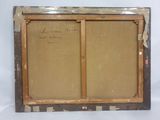 an old picture frame with a picture of a man and a woman on it