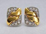 two tone gold and silver earrings with diamonds