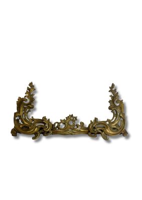 Devant de cheminée en bronze doré à décor rocaille