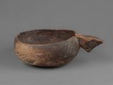 a close up of a bowl on a table with a gray background
