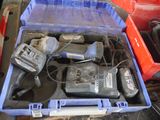 a blue box with tools in it sitting on a table