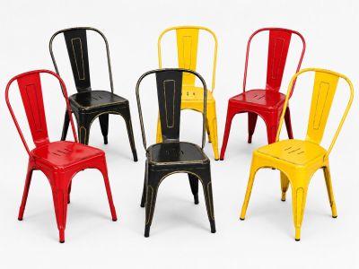 several different colored chairs are arranged in a circle on a white surface