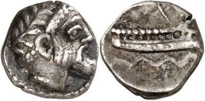 a silver coin with an image of a man on it