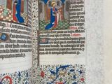 an open book with a picture of a man and a woman on it