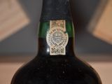 a bottle of wine that is sitting on a table