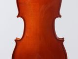 an old violin hanging from a string on a white background