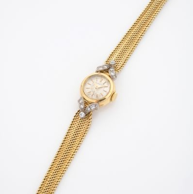 une montre-bracelet pour femme en or et diamants