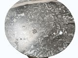 grey marble table top with a metal base on a white background