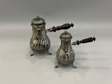 a pair of silverplated salt and pepper shakers