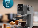 a close up of a coffee machine on a wooden table