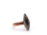 a close up of a ring on a white background