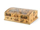 a small wooden box with a painting on it