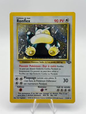 a close up of a pokemon card on a white surface