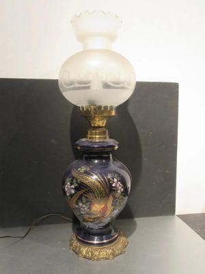 a lamp that is sitting on a table in a room