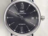 an image of a close up of a wrist watch on a white surface